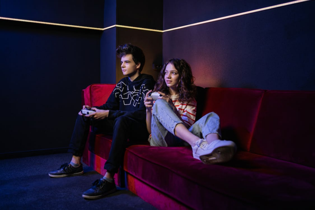 A Man and Woman Playing Video Games